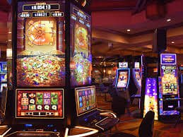 Filipino player spinning online slots on a smartphone with PHP balance visible